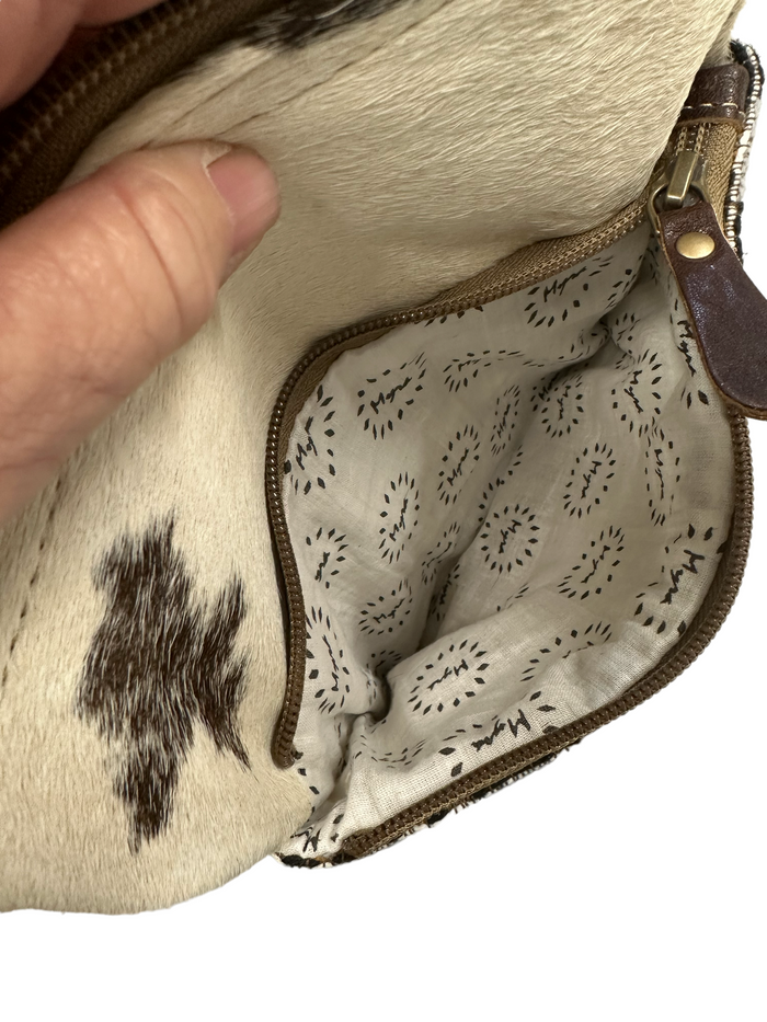 myra yellow and black cowhide canvas cross body bag with tooled leather.
