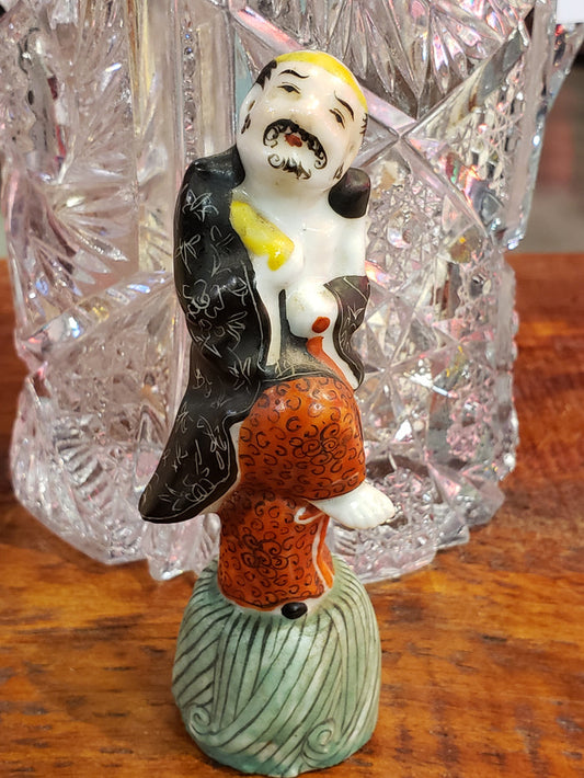 China dancing man porcelain figurine