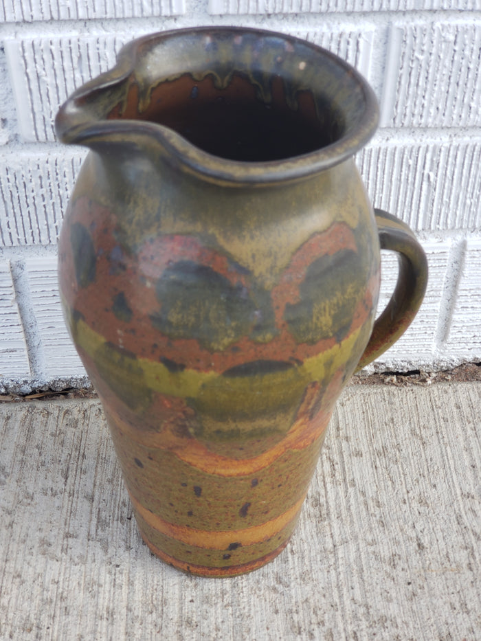 Green print glazed pottery pitcher