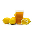 Cut lemons surrounding a glass filled with Summer Squeeze Lemon Shandy homebrew