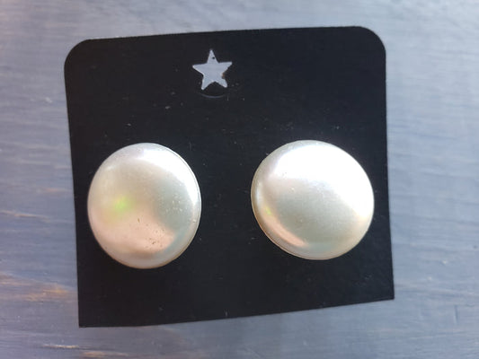 White cuff link pair